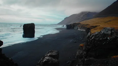Rocks and Black Sand on Pristine Beach, Coastline of Iceland, Stock Footage 260896422