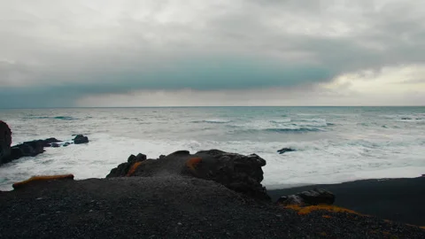 Rocks and Black Sand on Pristine Beach, Coastline of Iceland, Stock Footage 260897223