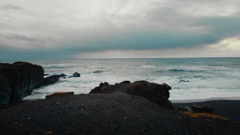 Rocks and Black Sand on Pristine Beach, Coastline of Iceland, Stock Footage 260897977