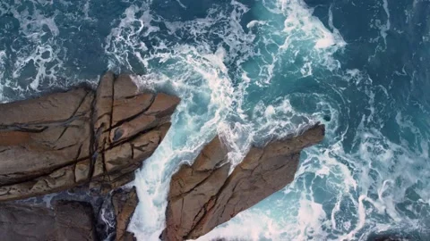Rocks And Cliff Crashed By Dangerous Waves In Arteixo - aerial descend 動画素材 239537173