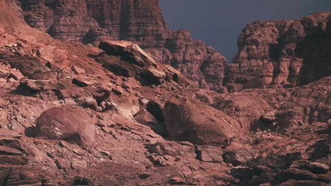 Rocks and cliffs in a rugged landscape during daylight Stock Footage 345064036