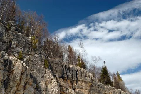 Rocks and clouds Stock Photos