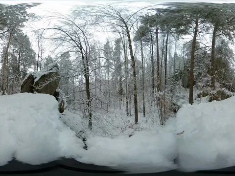 Rocks and Forest Covered in Snow Nature during Winter - 360 VR Stock Footage 83374806
