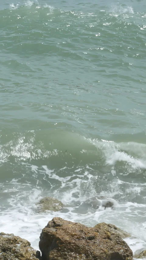 Rocks and Indian Ocean waves near Pandawa Beach, Bali - 4K, Handheld Stock Footage 303378053