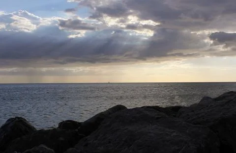 Rocks and Ocean at St Pete Beach Florida Late Afternoon Stock Photos