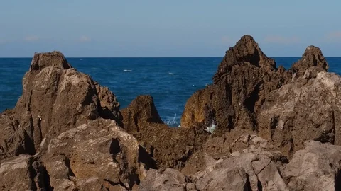 Rocks and the sea Stockbeeldmateriaal 97843320