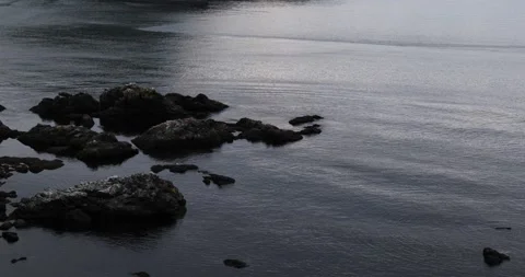 Rocks and sea with small waves Vídeo Stock 322869855