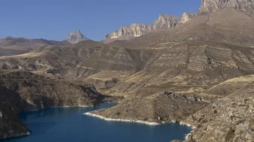 Rocks and the smooth surface of a mountain lake Stock Footage 85520855
