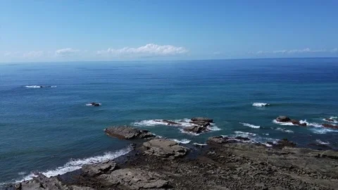 Rocks and waves along Costa Rica's Pacific coast Video stock 169871376