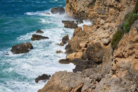 Rocks and waves background Stock Photos