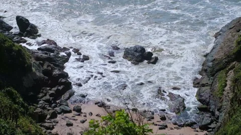 Rocks and waves on the beach Stock Footage 138284263