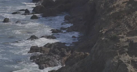 Rocks and Waves at beach in Malibu, California Stock Footage 137160895