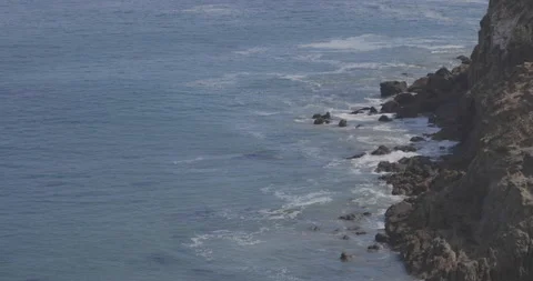 Rocks and Waves at beach in Malibu, California Stock Footage 137164312