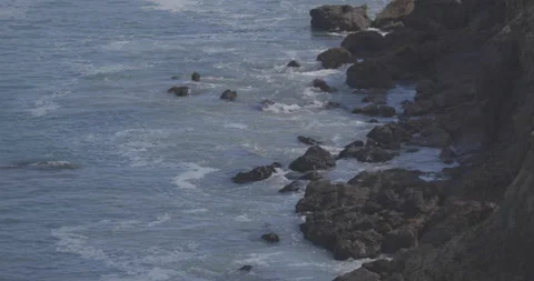 Rocks and Waves at beach in Malibu, California Stock Footage 137165346