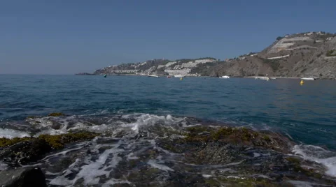 Rocks and waves, beachy behind Video stock 41426514