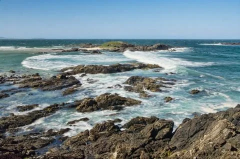 Rocks and waves Stock Photos