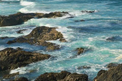 Rocks and waves Stock Photos