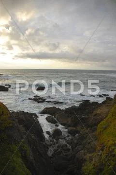 Rocks and waves Stock Photos