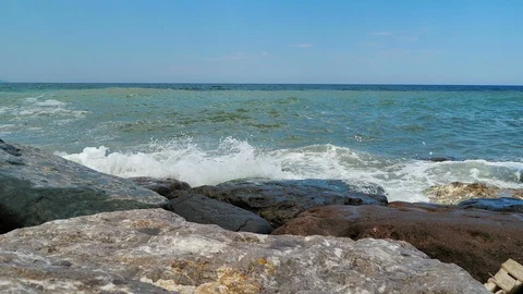 Rocks and waves in windy weather Stock Footage 93584986