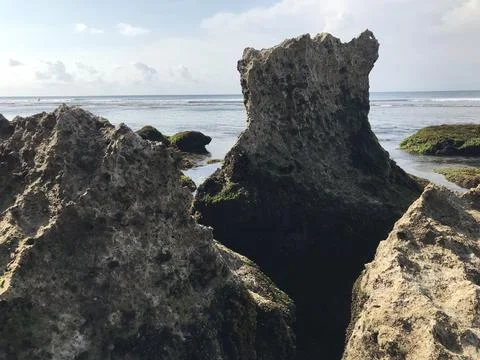 Rocks in bali beach Stockfoto's
