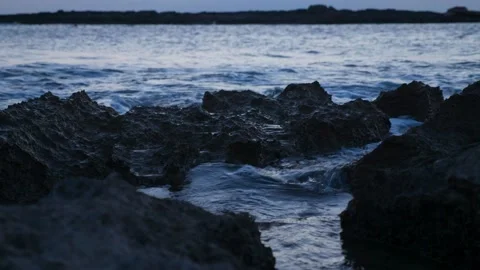 Rocks bathed by the ocean Stock Footage