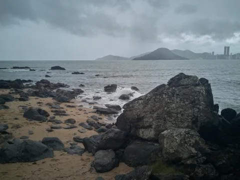 Rocks on the beach after the storm Stock Photos