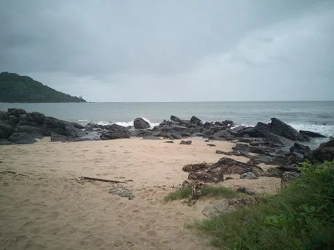 Rocks on the beach after the storm Stock Photos