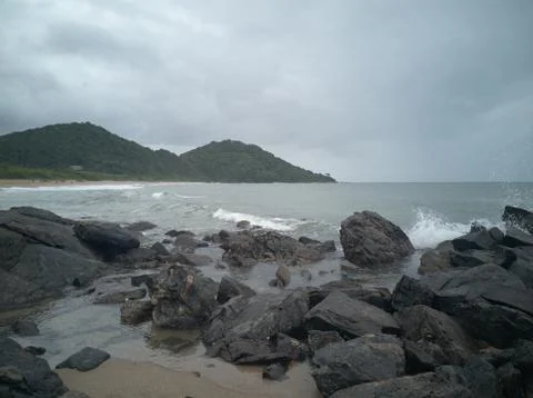 Rocks on the beach after the storm Stock Photos