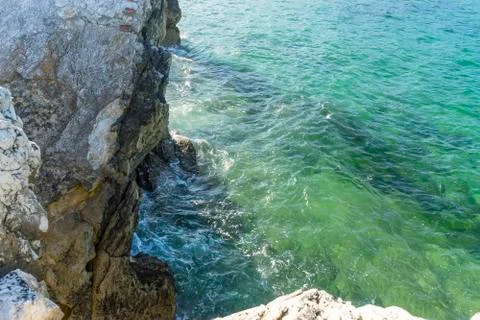 Rocks on the beach. Dramatic view of rocky coastline in Santander, Spain. Stock Photos