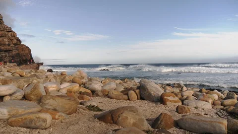 Rocks on the beach. Low down view. Crashing waves. Travel, Cape Point. Vídeo Stock 127958366