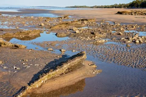 Rocks On The Beach At Low Tide Stock Photos