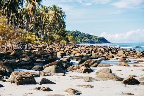 Rocks on beach at sky. Stock Photos