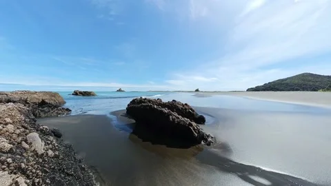 Rocks on black sand Beach Stock Footage 218543776