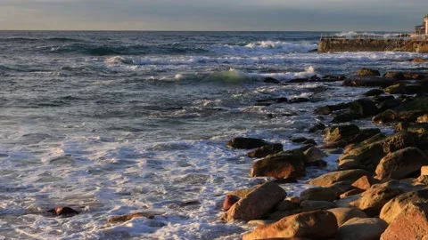 Rocks of Bondi beach in Sydney in soft morning light to rock pool as 4k. Stock Footage 137392269