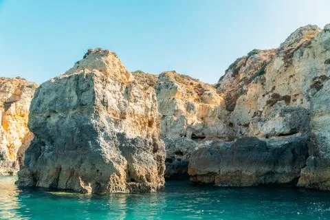 Rocks, Cliffs And Ocean Landscape At Lagos Bay Coast In Algarve, Portugal Stock Photos