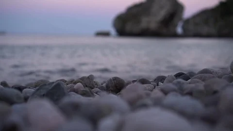 Rocks close up, with bigger rocks in the background (bokeh) Video stock 79037718