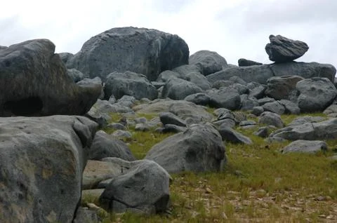 Rocks on cloudy day Stock Photos