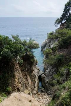 Rocks on the coast of Lloret de Mar in a beautiful summer day, Costa Brava Stock Photos