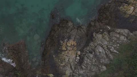 Rocks coming out of clear waters in the English Channel Stock Footage 288743723