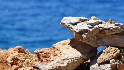 Rocks With  Crystal blu Sea In Background Stock Footage 78922119
