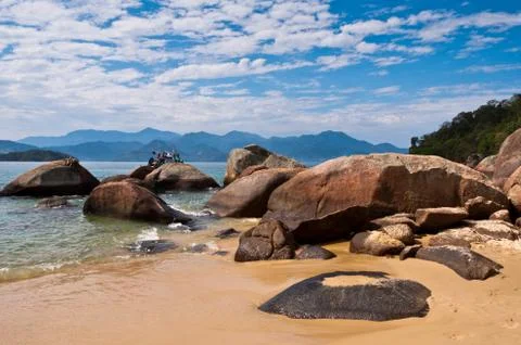 Rocks on Empty Beach 스톡 사진