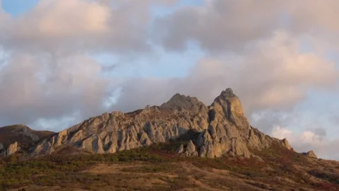 Rocks of the extinct volcano KaraDag in autumn sunset Stock Footage 306362026