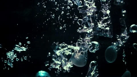 Rocks Fall and Create Splashes and Ripples Stock Footage 300884733