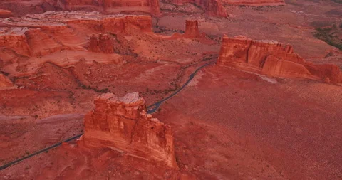 Rocks with flat tops and cliff slopes in the Arches National Park, USA. Stock Footage 322067679