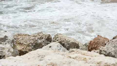 Rocks on the foreground and Indian Ocean waves near Pandawa Beach, Bali - 4K Stock Footage 183310155
