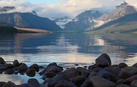 Rocks in foreground with mountain background Stock Photos