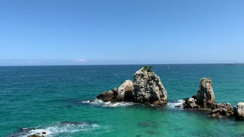 Rocks formations next to the Chuam Chotdaebawi Rock. Donghae, South Korea Stock Footage 311651834