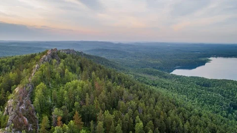 Rocks on a hill at sunset. Ural mountains. Chelyabinsk region. Russia Stock Footage 119826569