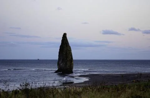 Rocks of the island of Kunashir. Stock Photos