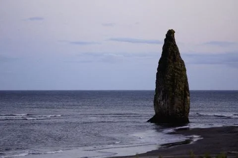 Rocks of the island of Kunashir. Stock Photos
